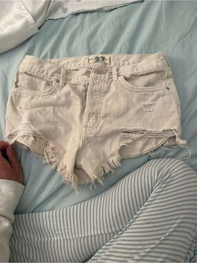 Free People Cream Distressed Denim Cutoff Shorts